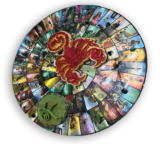 Circular wooden picture with holographic cards with many college-type stickers RGB LED lighting covered in resin appliques 3D printing zodiac sign scorpion
